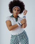 A pack of "Birdie Bands" from Fore All's collection, designed for active women. The set includes a matching headband and two wristbands in Fore All's signature colors. Perfect for golf, tennis, or workouts, the headband keeps hair in place while the wristbands add style and keep sweat in check.