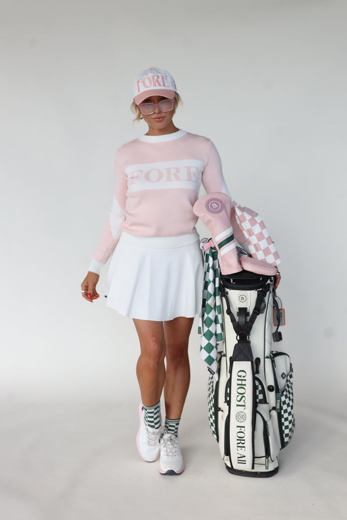 Fore Sweater in Pink/White, a fan-favorite known for its cozy comfort and stylish design, perfect for on and off the golf course.