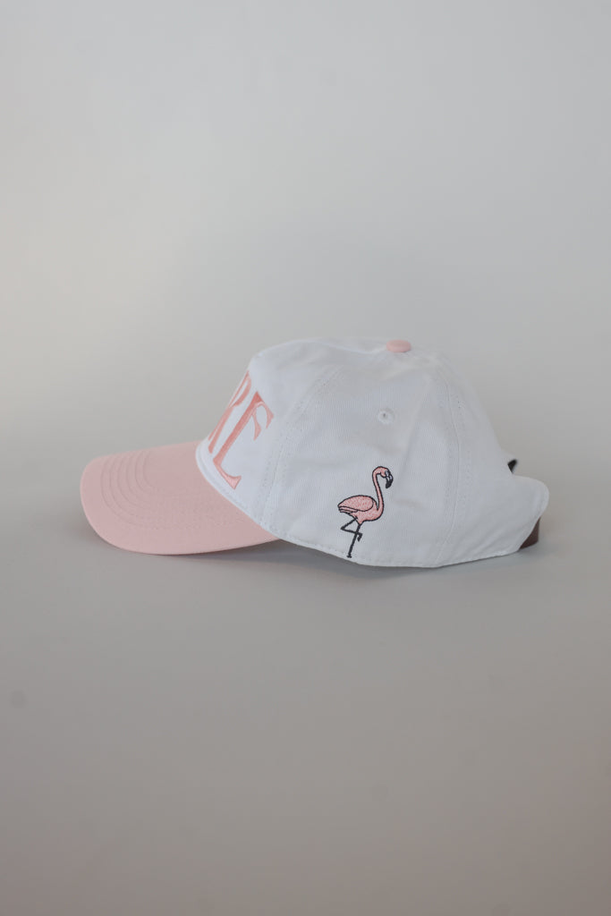 Fore Hat in Pink/White, a vintage-inspired Dad Hat combining style and comfort with an adjustable design for a perfect fit. Ideal for any occasion, on or off the golf course.